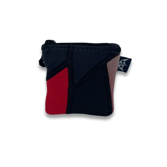 Recycled coin purse with zipped closure and security loop. Made from recycled wetsuits in red and black.