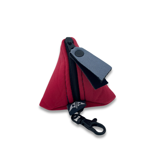 Pyramid shaped neoprene keyring pouch with zipped closure and keyring attachment. Made from recycled wetsuits in red.